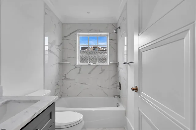 a view of a living room a window and a fireplace