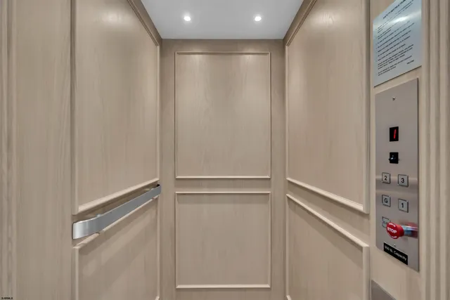 a kitchen with a stove a sink and a refrigerator