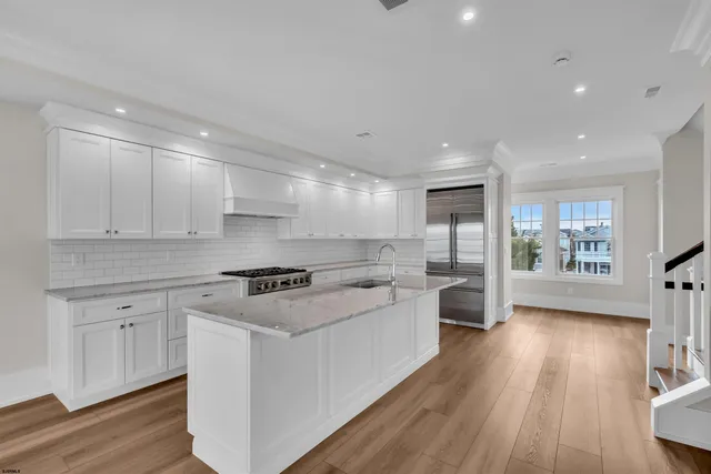 a view of an empty room with a balcony