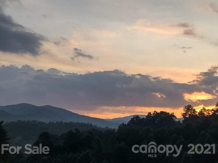 0 Gambrell Hill Road, Unit 5 Clyde, NC 28721 - Photo 1 of 8 a view of mountains and sunset