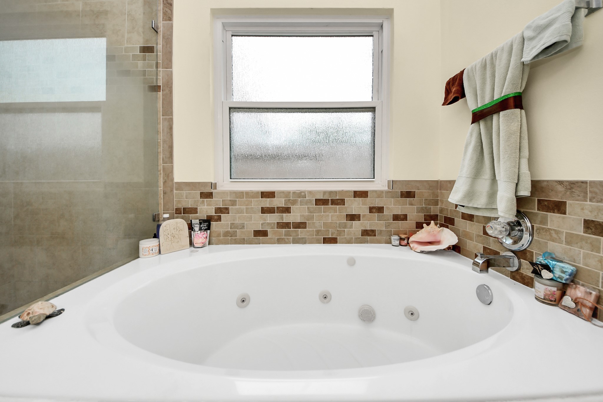 23814 Spring Dane Drive Spring, TX 77373 - Photo 27 of 41 a bathroom with a bathtub and a sink