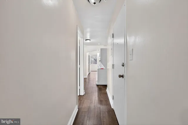 a view of a bathroom from the hallway