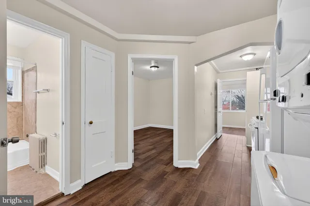 a view of entryway with wooden floor