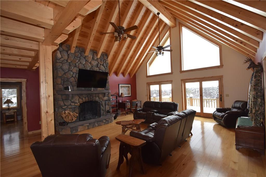 249 A Owlsboro Road Mount Chase, ME 04765 - Photo 14 of 35 Massive cultured stone wood burning...