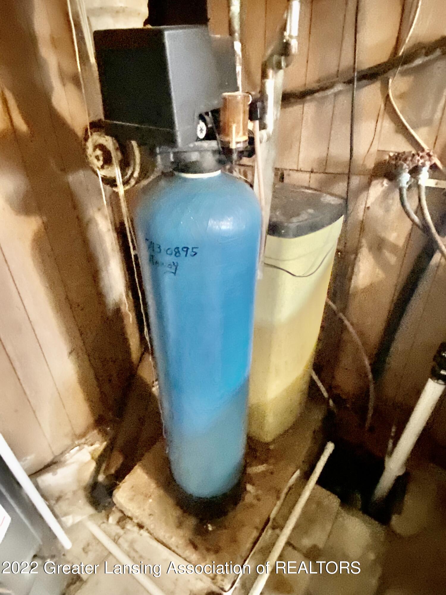 2210 South Cochran Road, Unit R4 Charlotte, MI 48813 - Photo 24 of 25 basement h20 softner