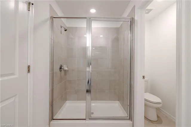 a bathroom with a double vanity sink and mirror