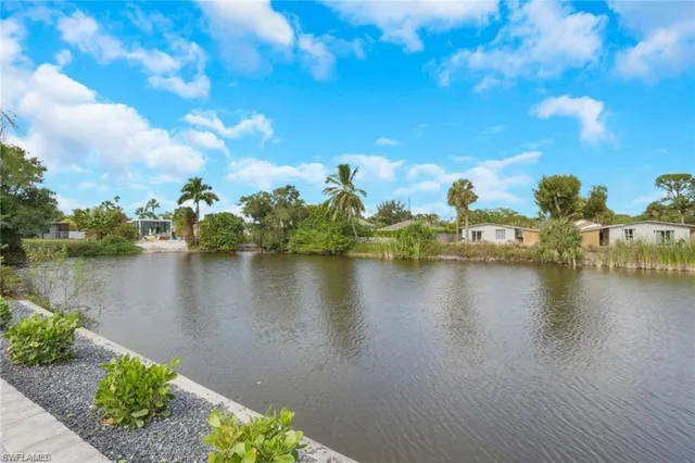 a view of a lake with a house