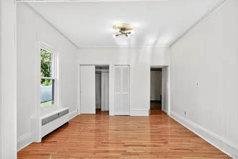 a view of an empty room and window
