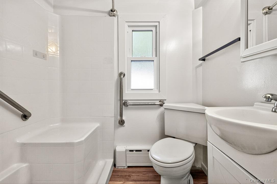 15 Paye Avenue Beacon, NY 12508 - Photo 20 of 36 a bathroom with a sink a toilet and a bathtub