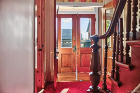 a view of a room that has a window in it