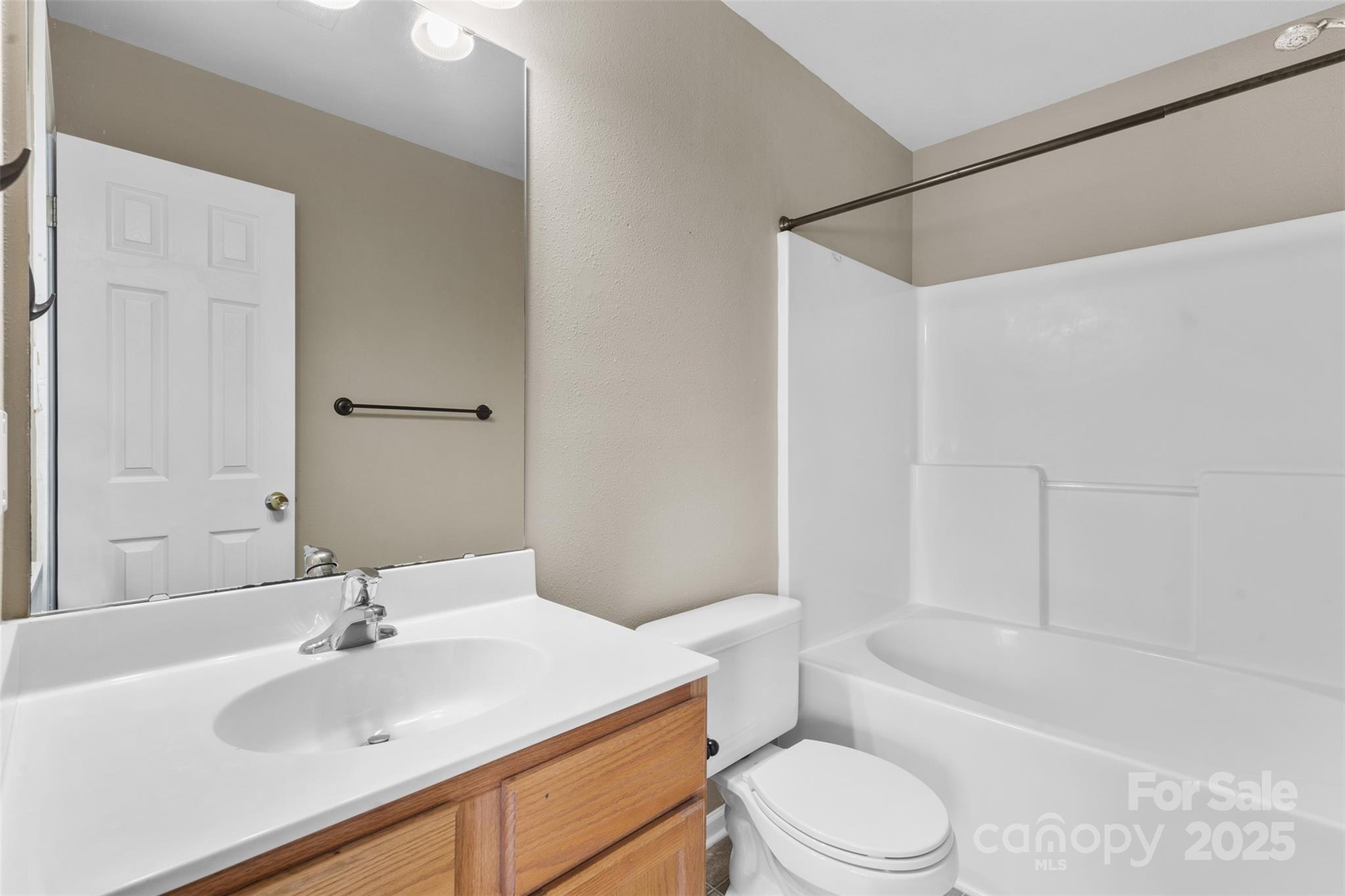6320 Rhodins Lane Fort Mill, SC 29707 - Photo 17 of 33 a bathroom with a sink toilet and a bathtub
