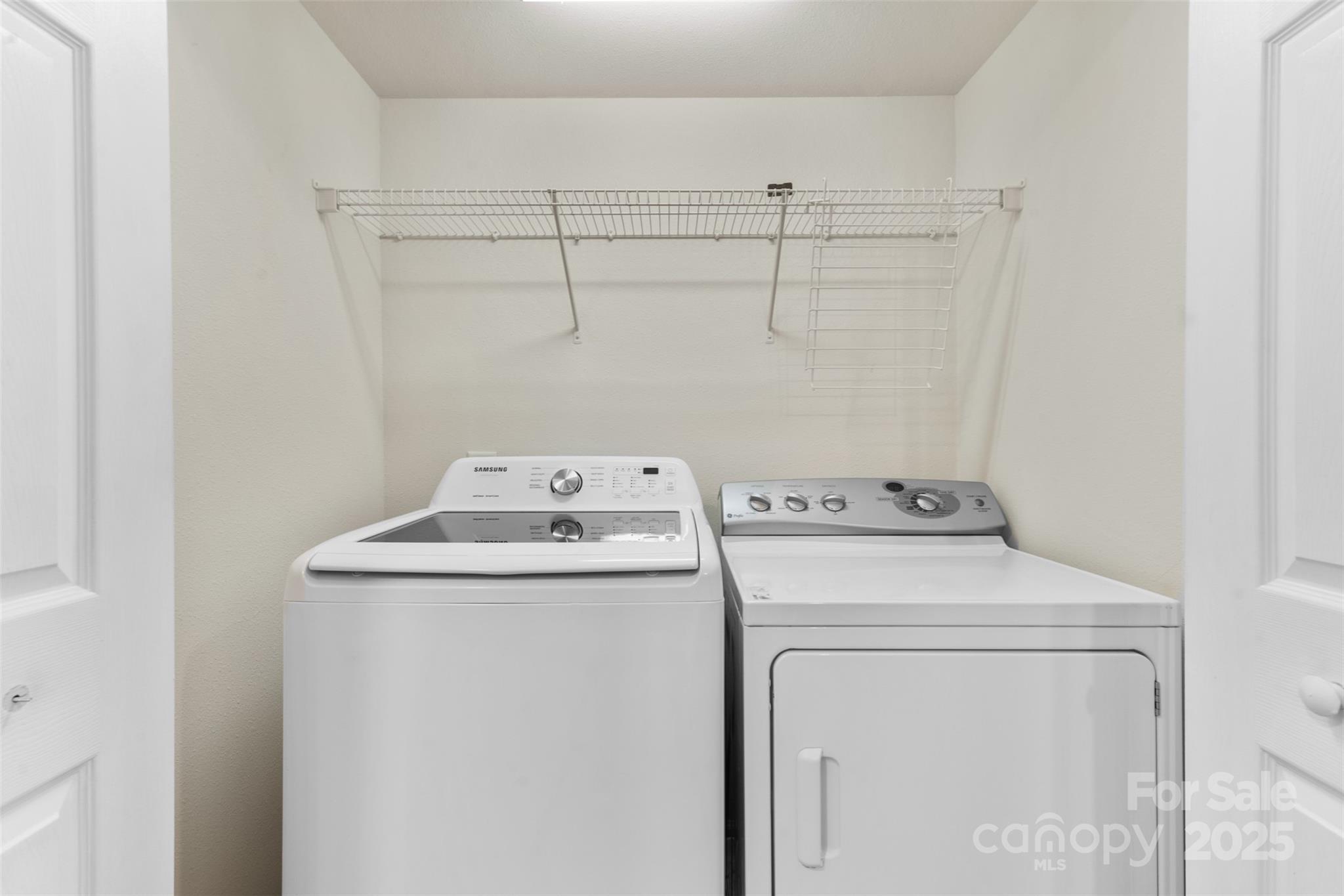6320 Rhodins Lane Fort Mill, SC 29707 - Photo 23 of 33 a utility room with dryer and washer