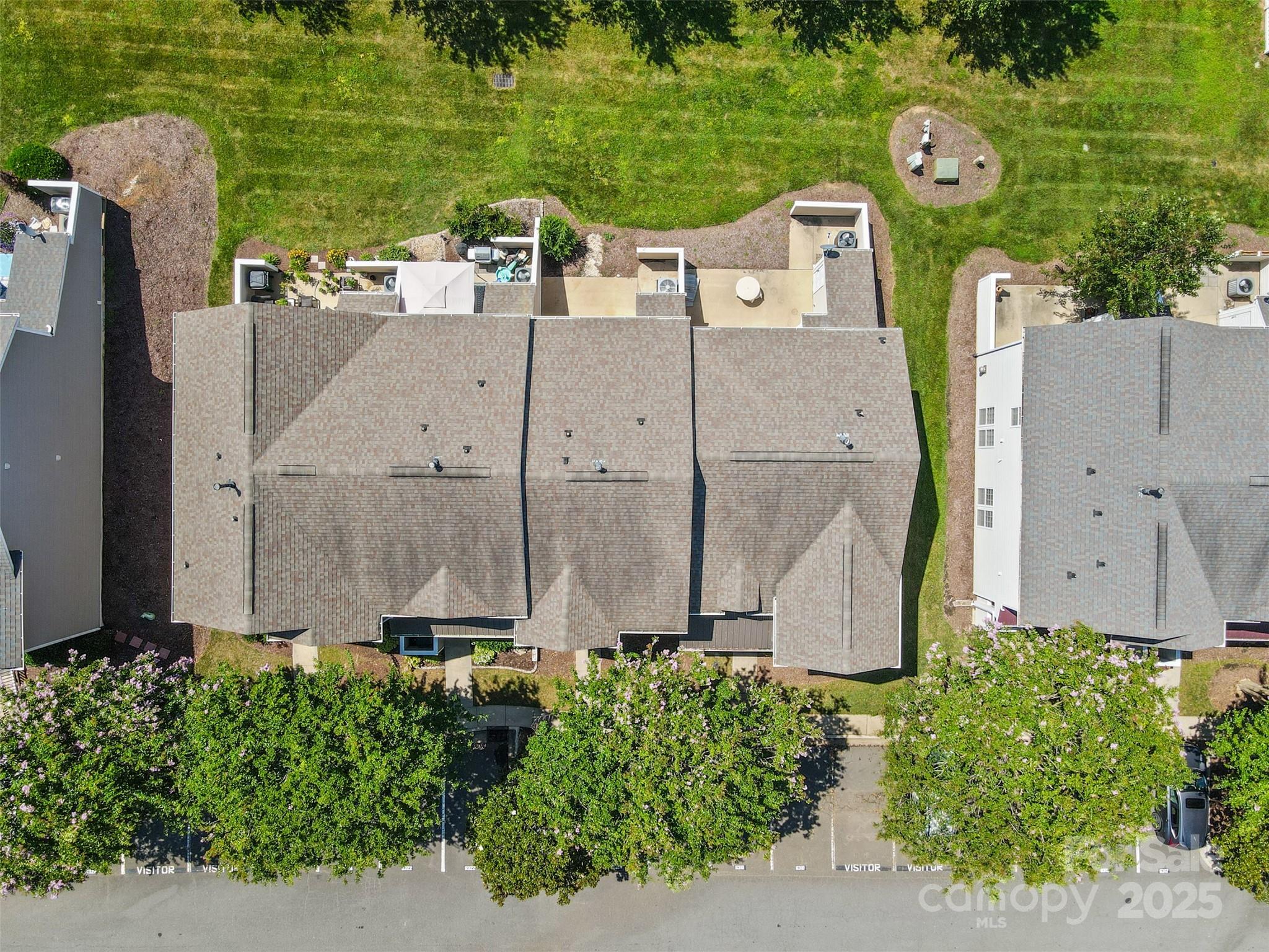 6320 Rhodins Lane Fort Mill, SC 29707 - Photo 31 of 33 an aerial view of a house with a garden and a yard