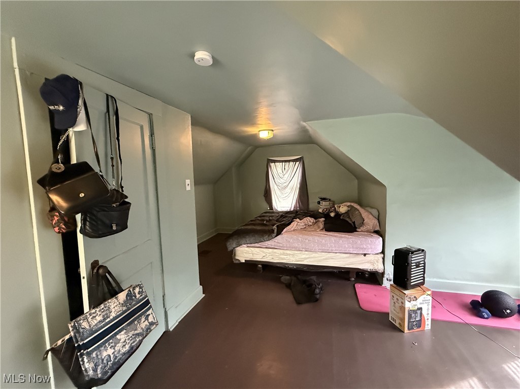 799 London Road Cleveland, OH 44110 - Photo 10 of 16 Bedroom featuring baseboards and lofted ceiling