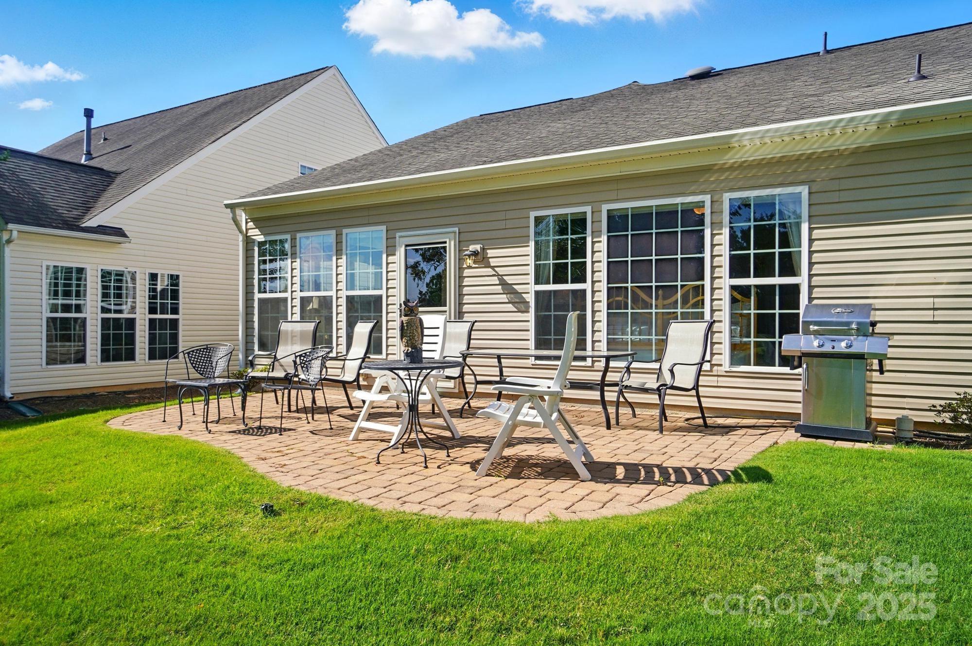 1974 Links View Drive Fort Mill, SC 29707 - Photo 27 of 30 a view of a house with backyard and sitting area