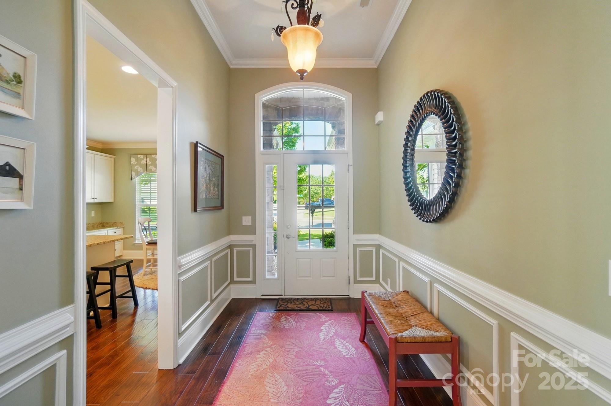 1974 Links View Drive Fort Mill, SC 29707 - Photo 3 of 30 a view of a hallway with wooden floor and windows