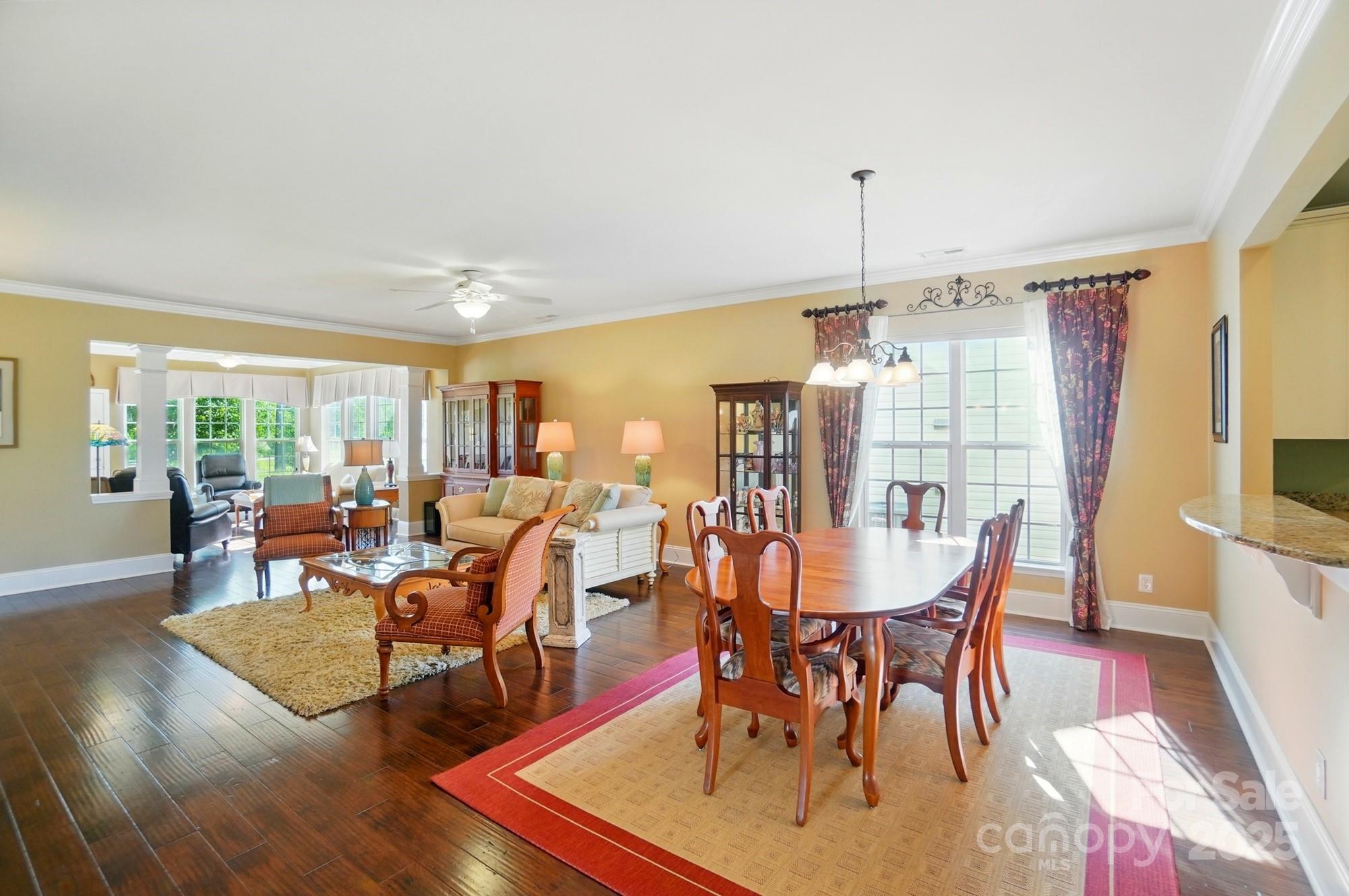 1974 Links View Drive Fort Mill, SC 29707 - Photo 9 of 30 a view of a dining room with furniture window and wooden floor