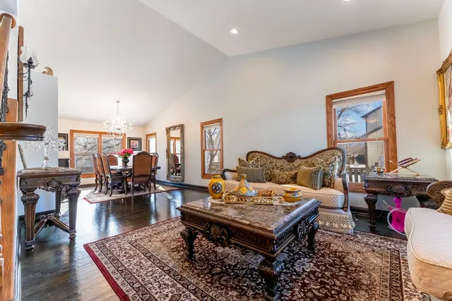 a living room with furniture and a table