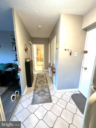 a view of a livingroom with the furniture