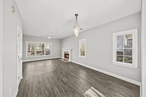 a kitchen with stainless steel appliances granite countertop a refrigerator sink and cabinets