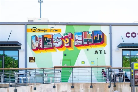 a view of outdoor space with swimming pool and trees in the background