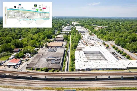 a view of a swimming pool with outdoor seating