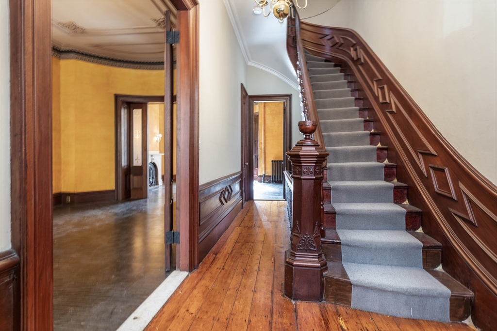 56 Rutland Square Boston, MA 02118 - Photo 11 of 28 a view of entryway and hall with wooden floor