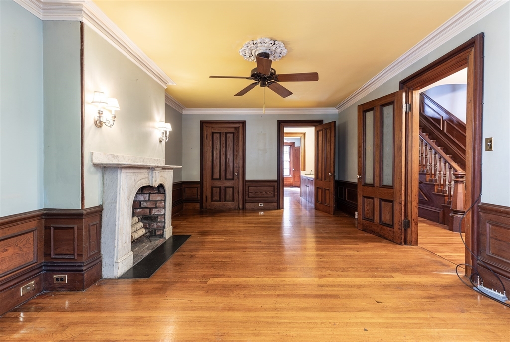 56 Rutland Square Boston, MA 02118 - Photo 15 of 29 a view of a livingroom with furniture hardwood floor and a ceiling fan
