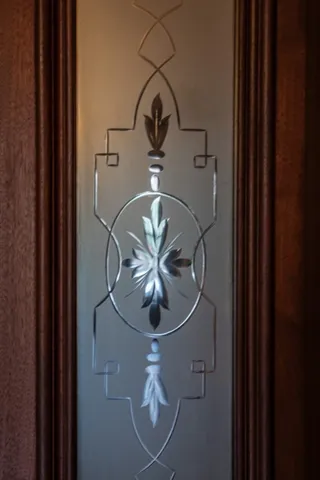 a close view of a chandelier in the background