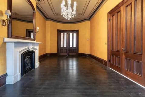 a view of livingroom with furniture and hardwood floor
