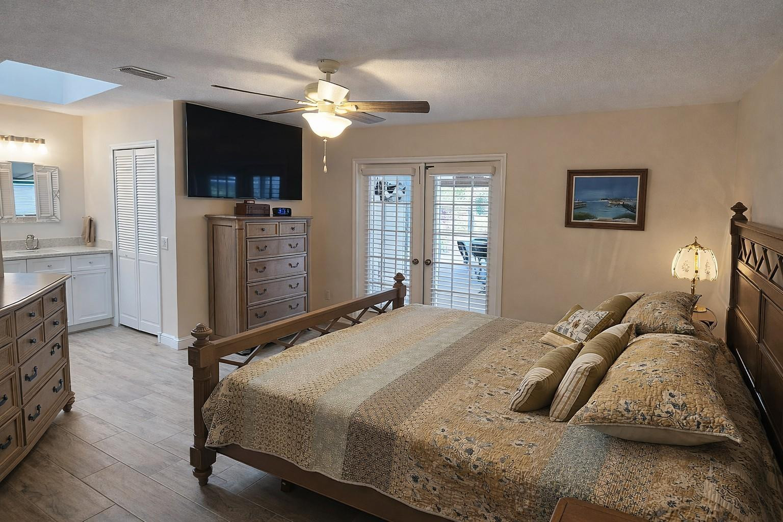 728 North Fischer Circle Sebastian, FL 32958 - Photo 13 of 23 a bedroom with a bed and a flat screen tv