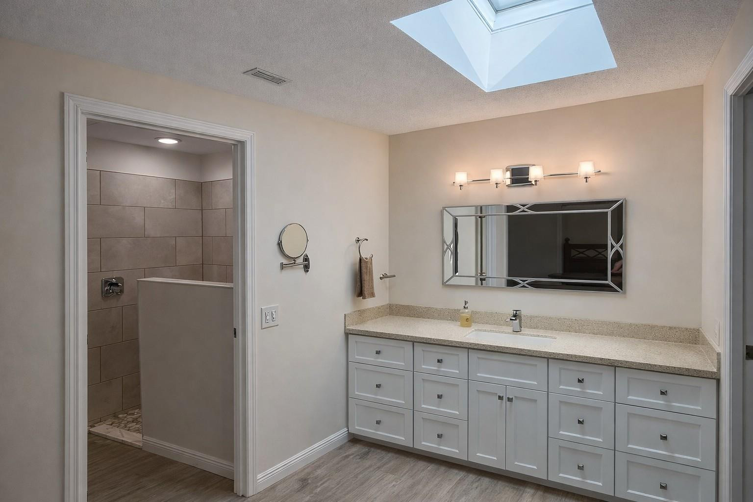 728 North Fischer Circle Sebastian, FL 32958 - Photo 15 of 23 a bathroom with a double vanity sink and mirror