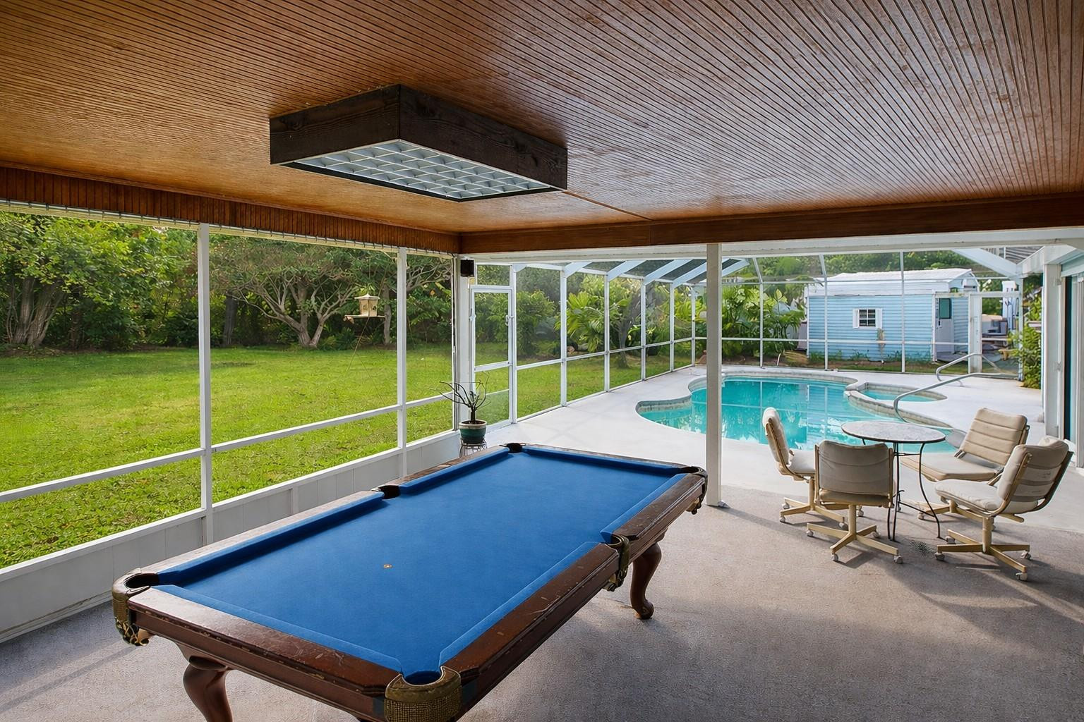 728 North Fischer Circle Sebastian, FL 32958 - Photo 20 of 23 a view of a room with a table and chairs