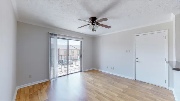 a view of a kitchen with a sink and dishwasher
