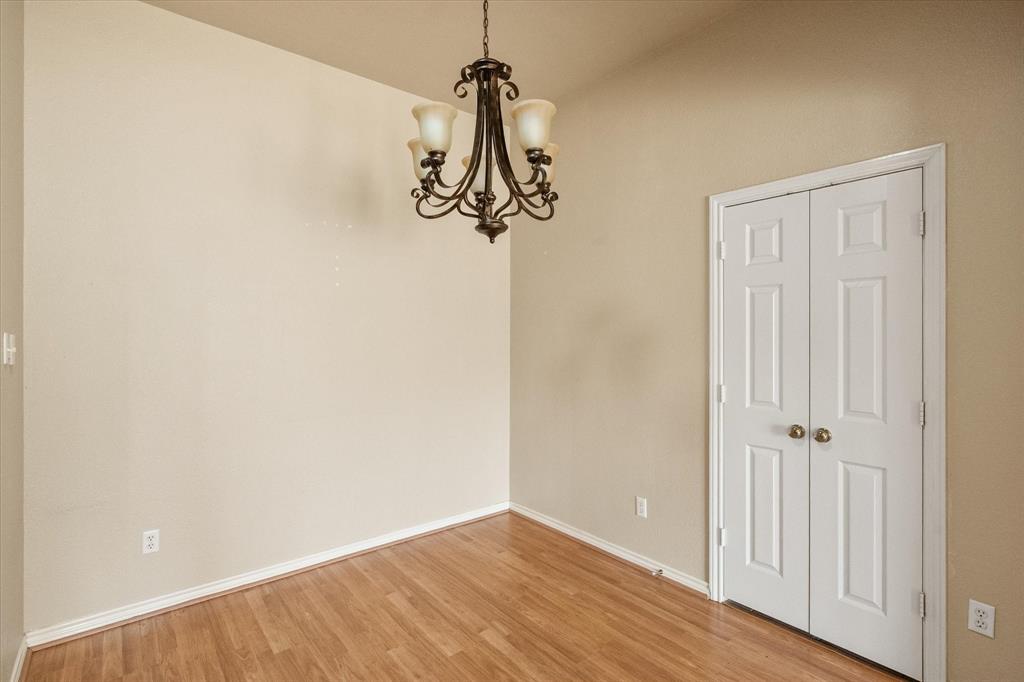 2327 Ragland Road Mansfield, TX 76063 - Photo 19 of 31 a view of a room with wooden floor
