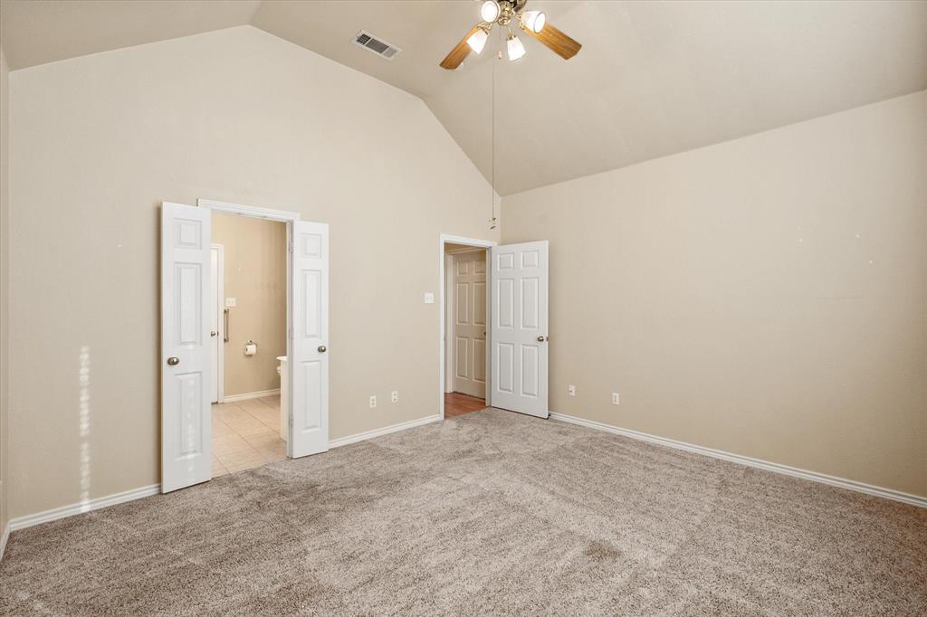 2327 Ragland Road Mansfield, TX 76063 - Photo 23 of 31 a view of an empty room with a chandelier fan