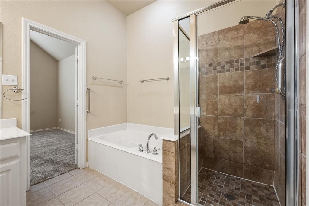 2327 Ragland Road Mansfield, TX 76063 - Photo 25 of 31 a bathroom with a bathtub and a shower