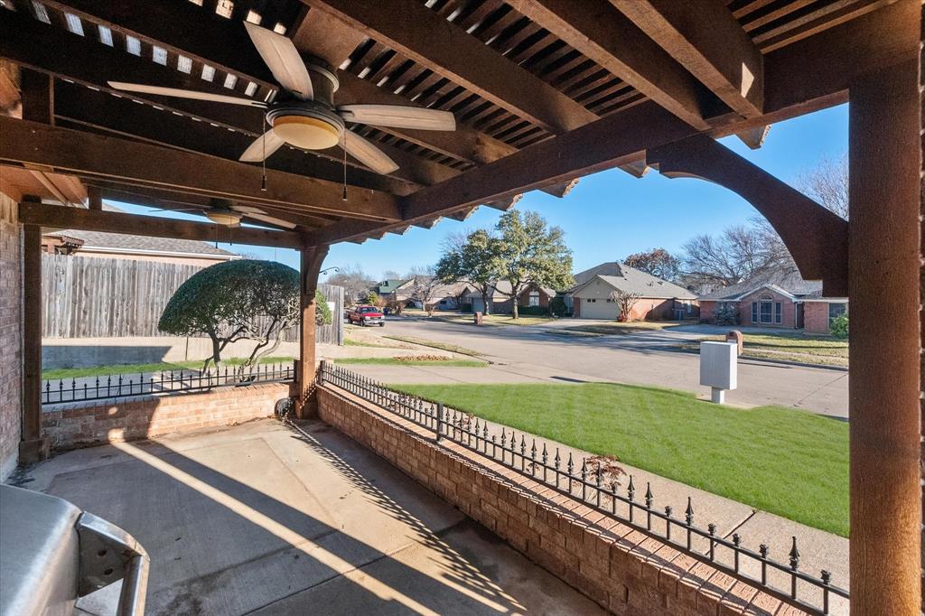 2327 Ragland Road Mansfield, TX 76063 - Photo 28 of 31 a view of a patio with a table and chairs