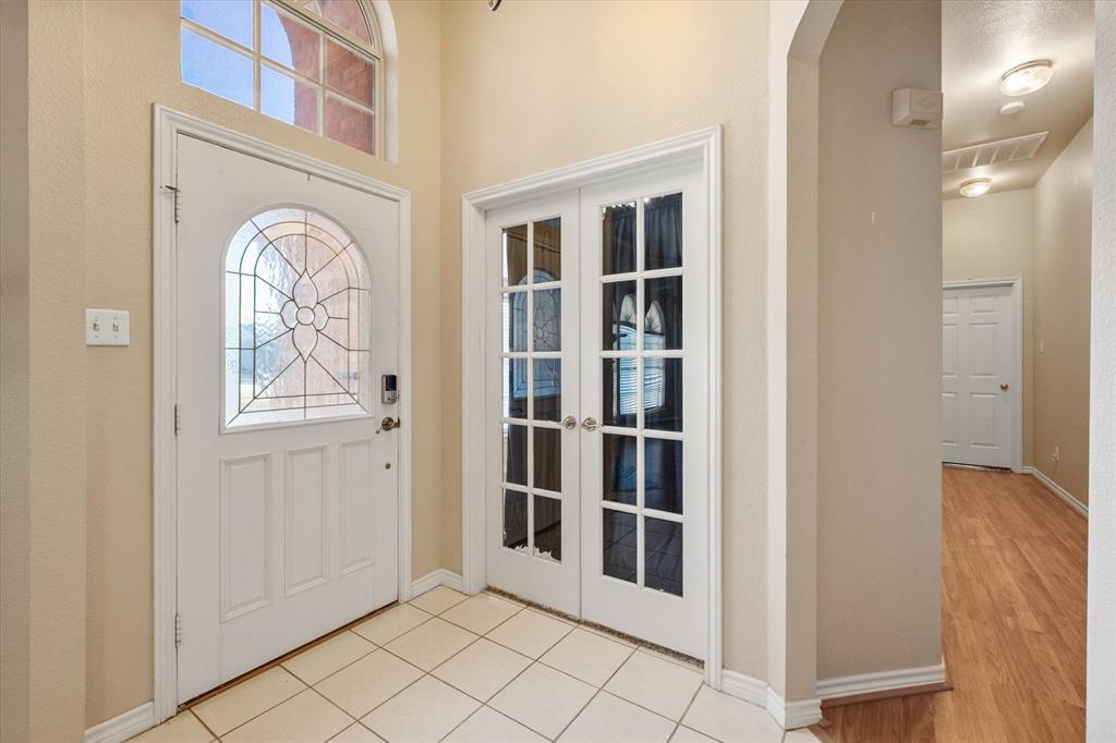 2327 Ragland Road Mansfield, TX 76063 - Photo 3 of 31 a view of front door with hallway