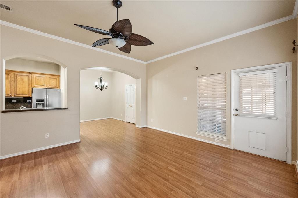 2327 Ragland Road Mansfield, TX 76063 - Photo 9 of 31 a view of empty room with wooden floor