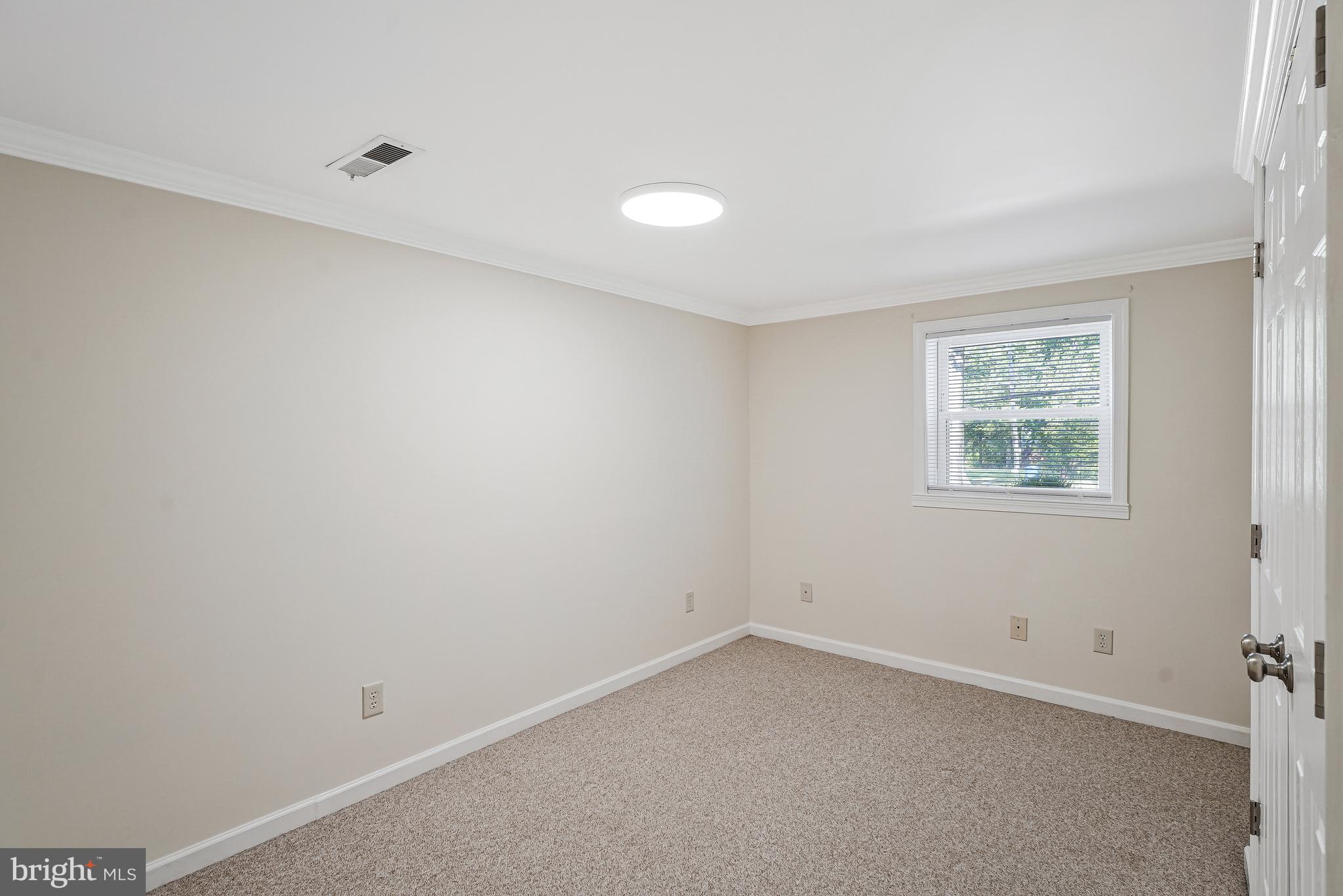 5801 Boothe Drive Burke, VA 22015 - Photo 19 of 30 an empty room with windows