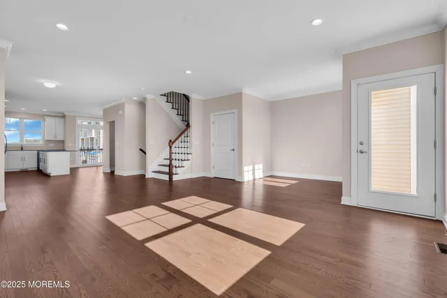 a view of a kitchen with a sink and a window