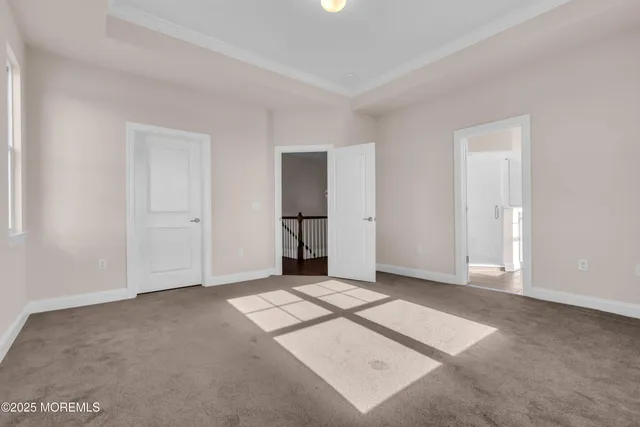 an empty room with a bathroom