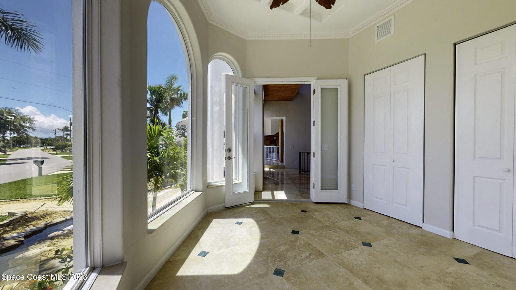 21 West Point Drive, Unit 101 Cocoa Beach, FL 32931 - Photo 12 of 59 a bathroom with a tub and shower