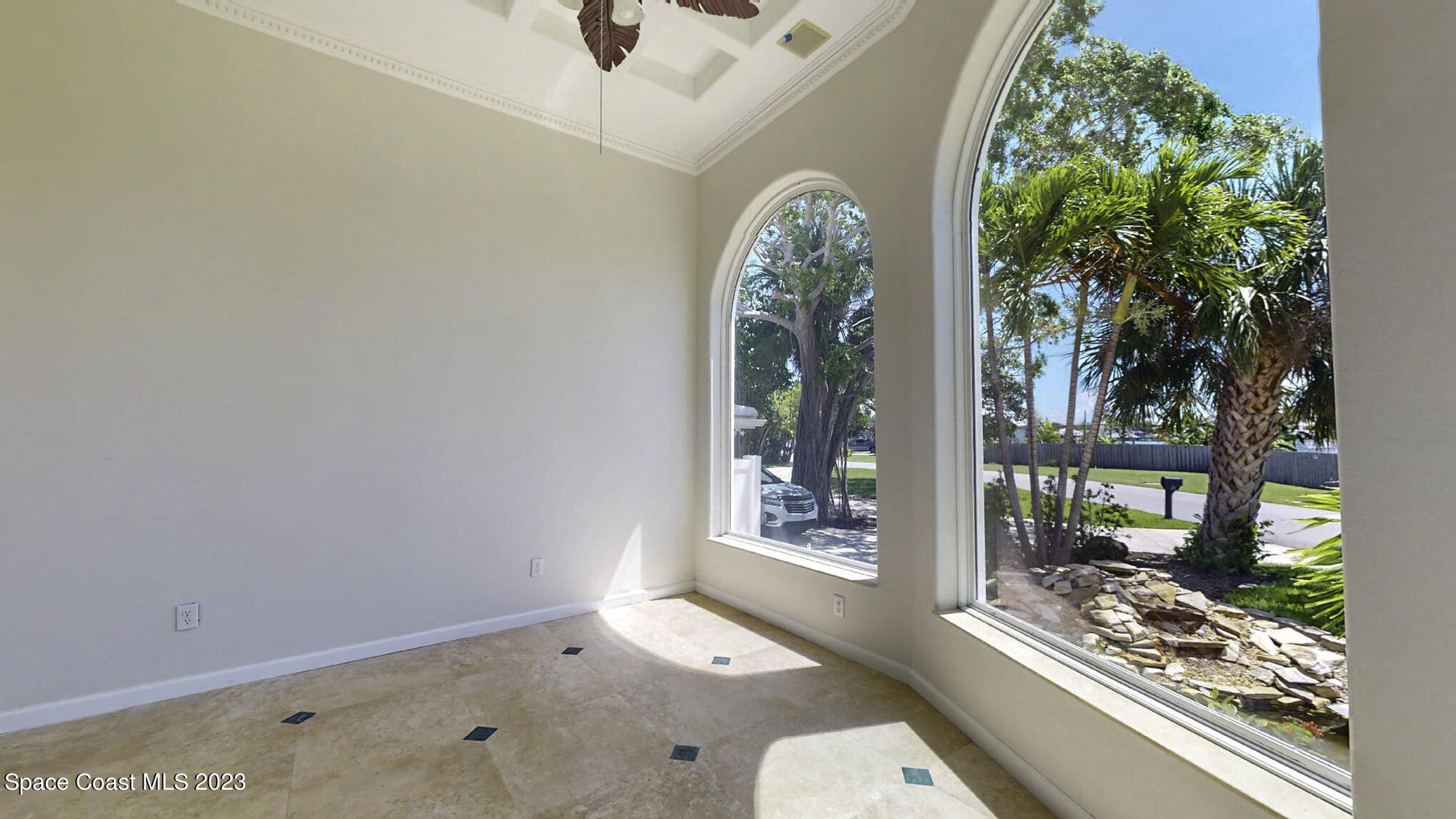 21 West Point Drive, Unit 101 Cocoa Beach, FL 32931 - Photo 13 of 59 a view of workspace with a window