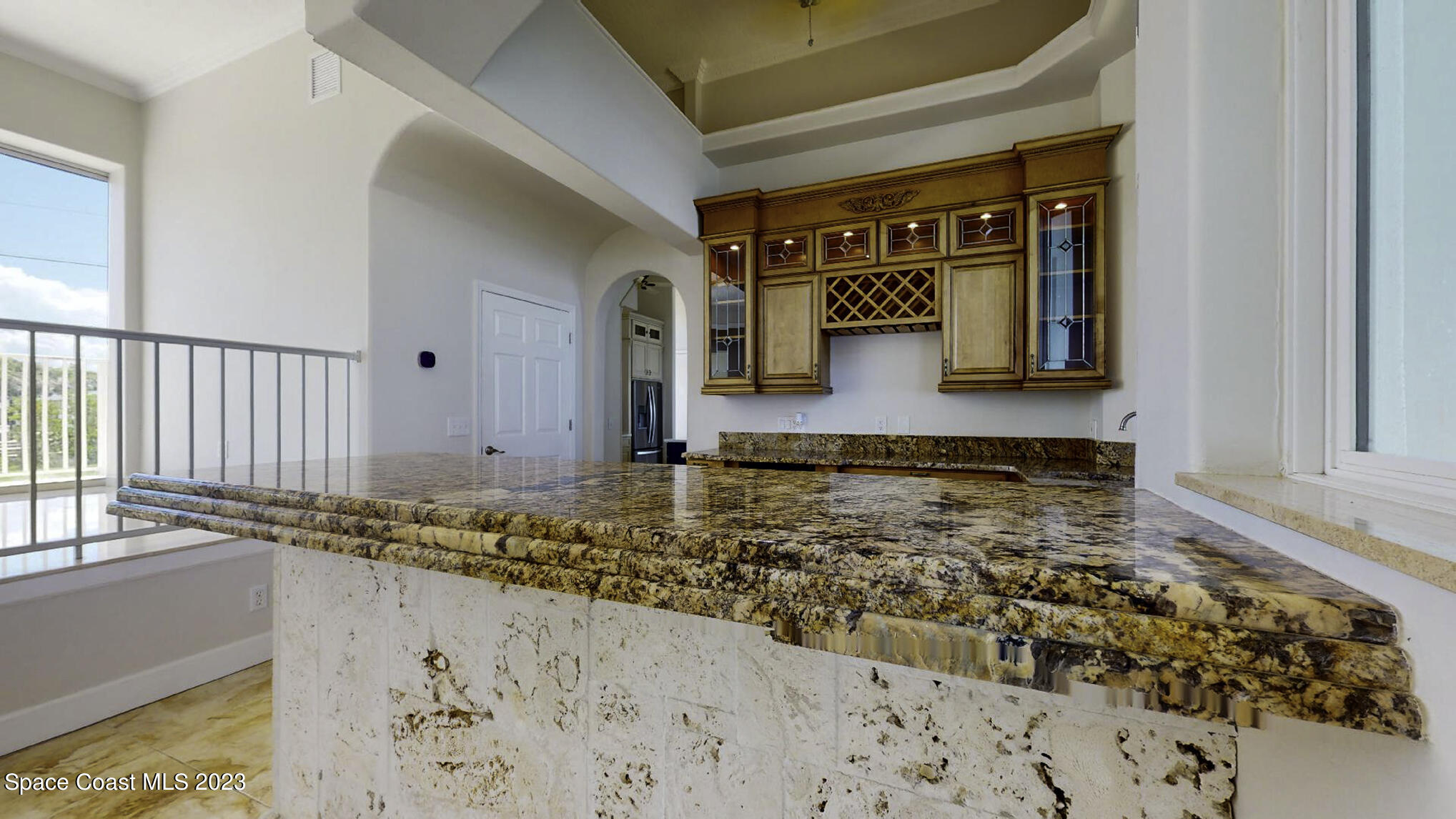21 West Point Drive, Unit 101 Cocoa Beach, FL 32931 - Photo 17 of 59 a view of a entryway door of the house