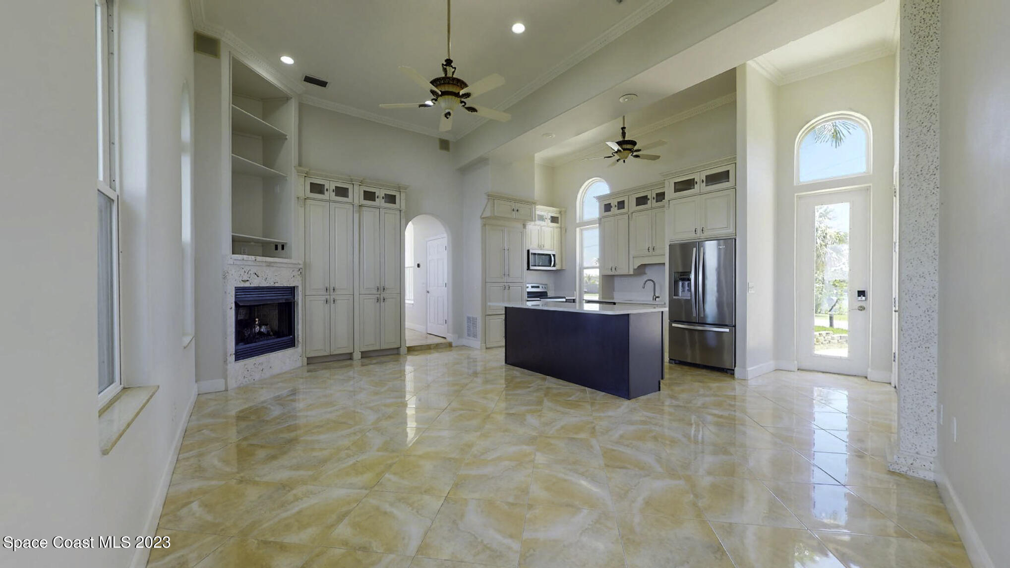 21 West Point Drive, Unit 101 Cocoa Beach, FL 32931 - Photo 27 of 59 a large bathroom with a sink and a mirror