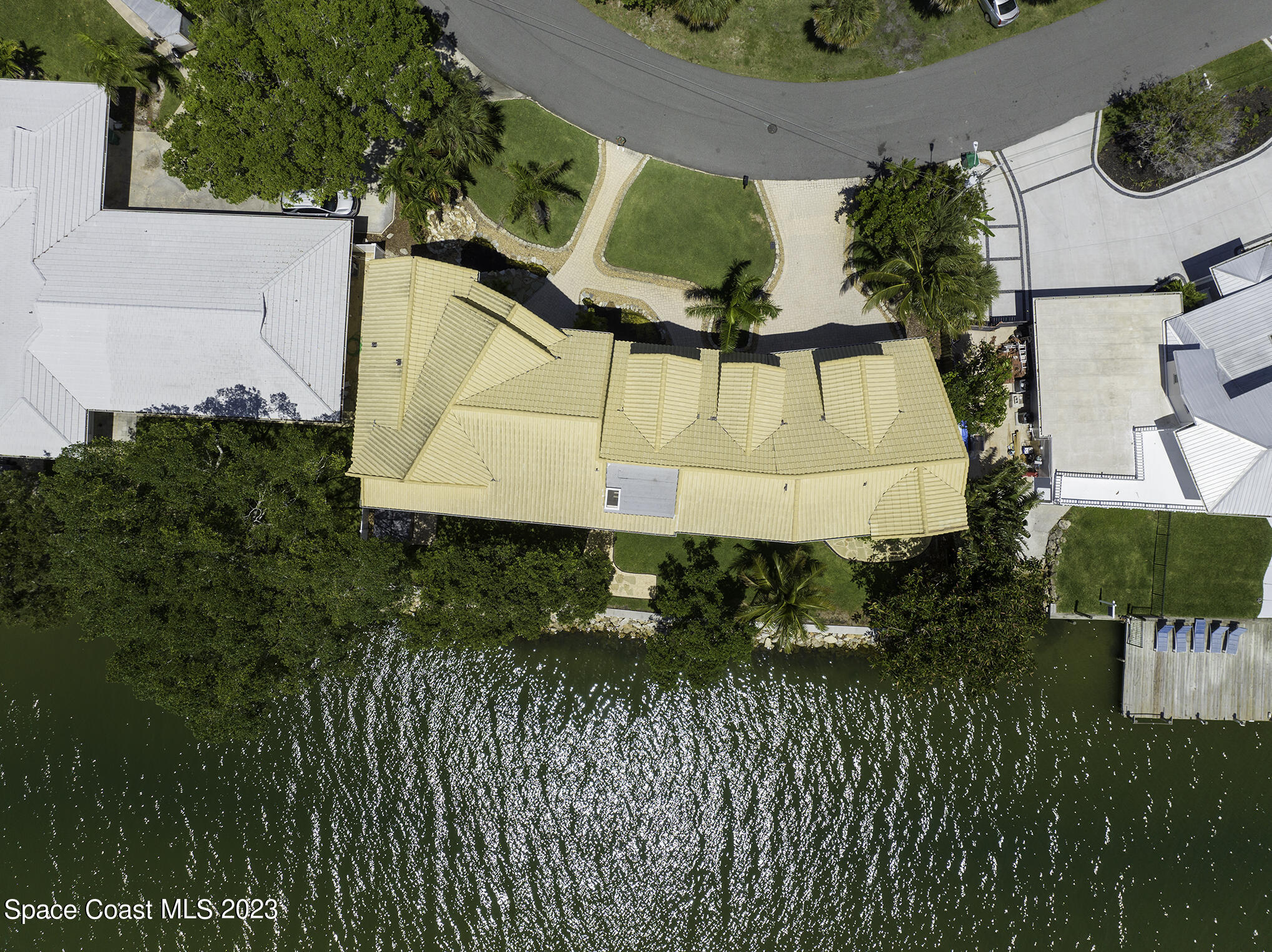 21 West Point Drive, Unit 101 Cocoa Beach, FL 32931 - Photo 3 of 59 a view of statue in a garden