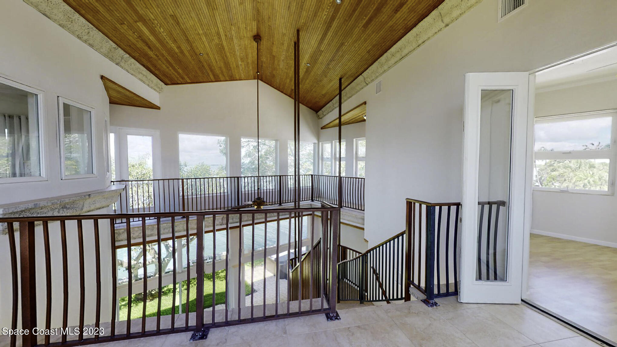 21 West Point Drive, Unit 101 Cocoa Beach, FL 32931 - Photo 41 of 59 a view of a balcony