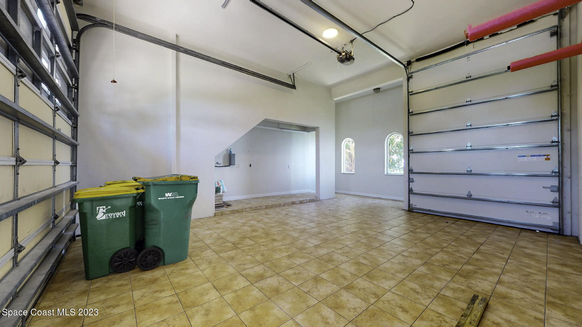 21 West Point Drive, Unit 101 Cocoa Beach, FL 32931 - Photo 43 of 59 a view of a room with storage and utility